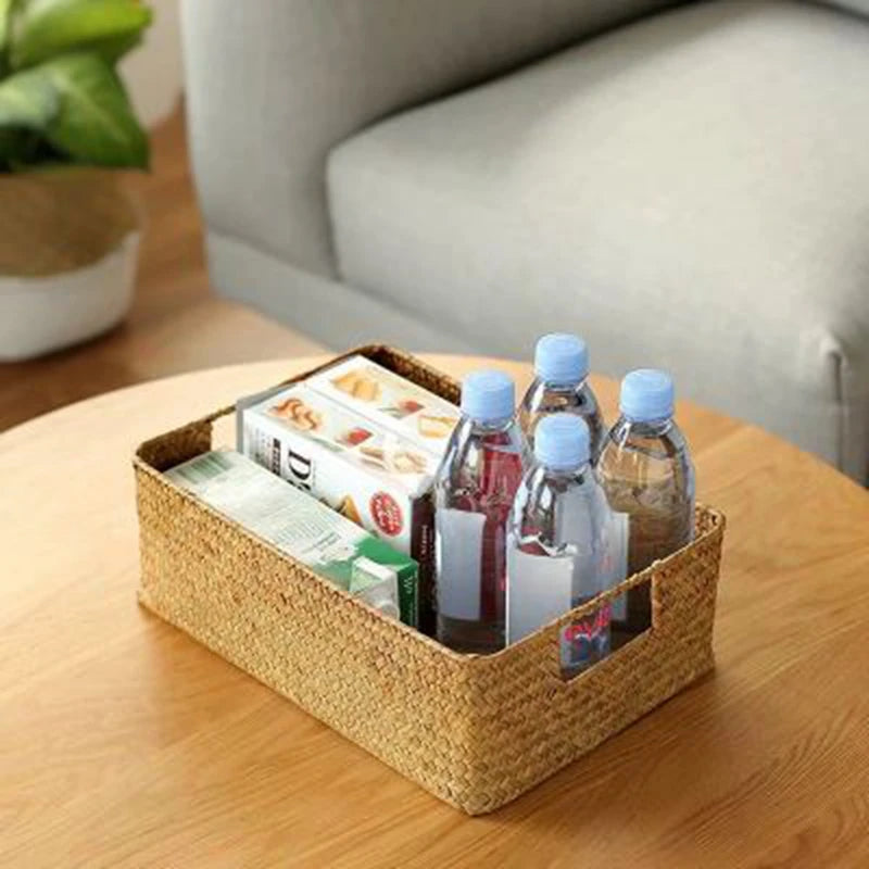 Basket on a table holding bathroom bottles and tubes