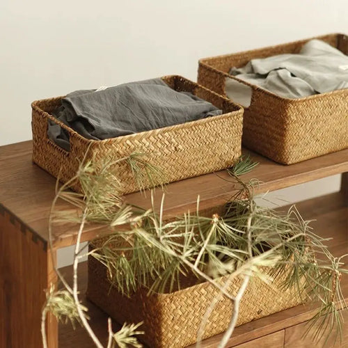 Woven seagrass trays on a shelf