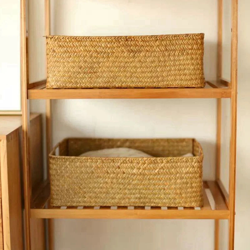 Seagrass basket sitting on an open wooden shelving unit