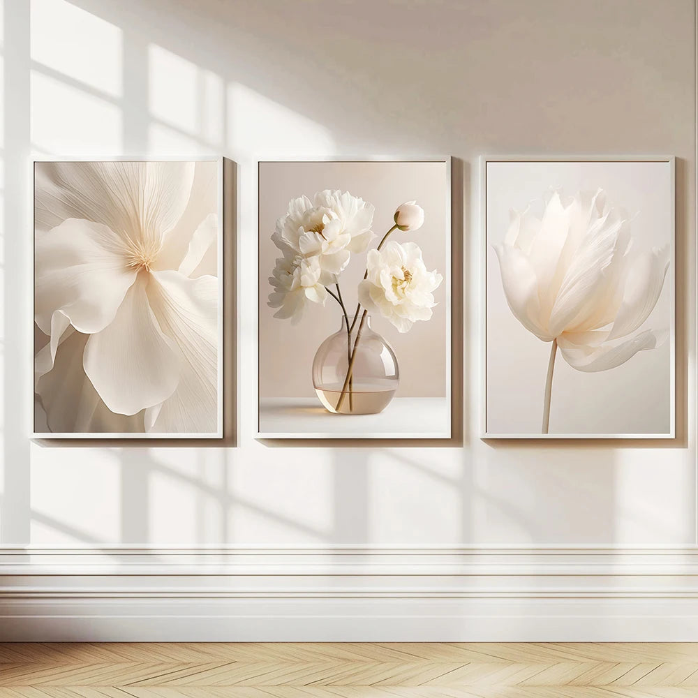 Three peony prints above a bed