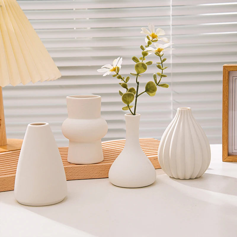 Vase trio with dried stems