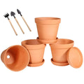 Four terracotta pots with saucers and mini planting tools