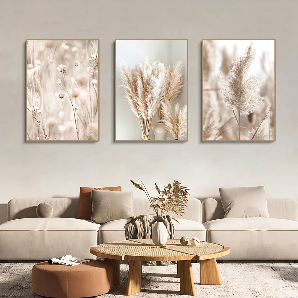 Pampas print trio above a sofa in a neutral living room