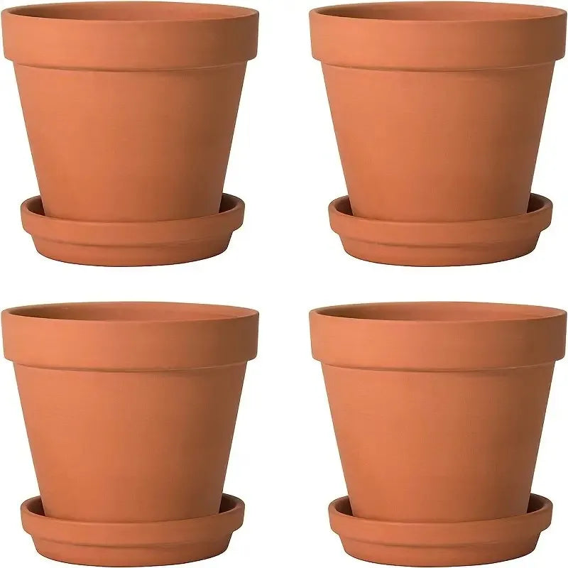 Terracotta pot set arranged on a surface